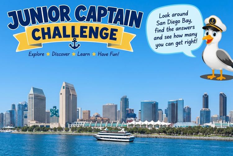 San Diego skyline with a boat, seagull cartoon in captain’s hat, and Junior Captain Challenge logo.