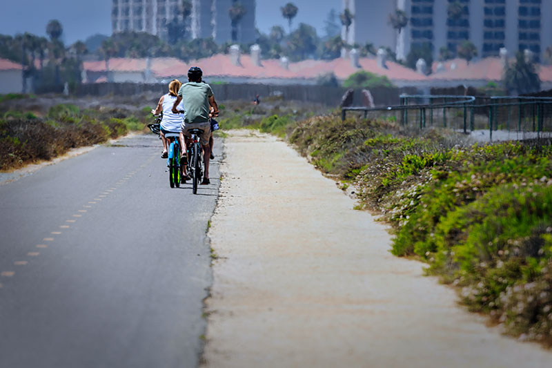 Biking along Silver Strand, part of the Bayside Bikeway around San Diego Bay